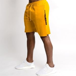 New Summer Men Gyms Shorts CalfLength Fitness Bodybuilding Fashion Casual Joggers Workout Beach Short Pants Sweatpants T200512