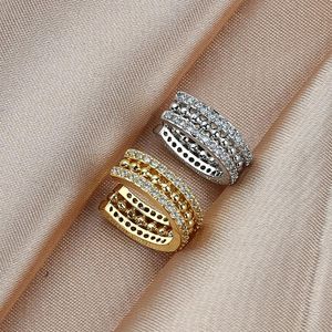 Stud ingen genomborrad dubbel rad Micro Pave Zircon Gold Clip Earrings for Woman Fashion Gifts klassiska mångsidiga smyckenstudier