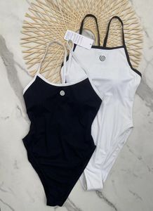 Sexig delad baddräkt Solid Bikini Set Gängad Nylon Badkläder Hög midja med kuddar Baddräkt för damer Sommarsele Simning Svart Vit Färg