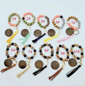 Favor Silicone Wooden Beaded Leopard Wristlet Bracelets PU Leather Tassel Bangle Wood Beads Wristband Key Ring Keychains Wrist Bands Christmas Gift F0526Q21