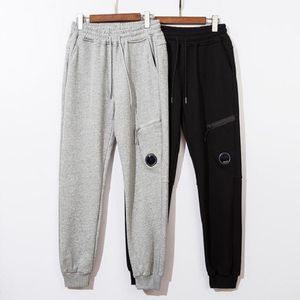 Pantaloni da uomo con una lente con logo e tuta da esterno rimovibile pantaloni casual in cotone con tasca con cerniera neri