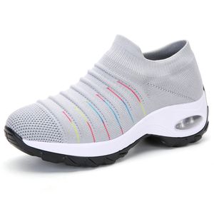 E-commerce di vendita calda da asporto Scarpe da donna taglie forti Cuscino d'aria Scarpa in maglia volante Moda casual Calzini sportivi Scarpe quattro