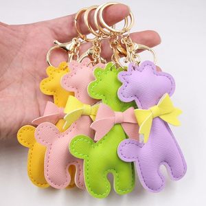 Ciondolo giraffa Portachiavi Accessori Donna Moda PU Fiocco in pelle Portachiavi per auto Anello Carino Macaron Borsa per animali Charms Portachiavi per cartoni animati Porta gioielli Regali