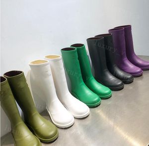 مصمم أحذية المطر النساء الأحذية السوداء Rev المطاط التمهيد بولي كلوريد الفينيل شعار Rainboots مظهر انفجار مشاهدة العلوي الأخضر الأبيض القدم لينة ضئيلة أحذية المياه