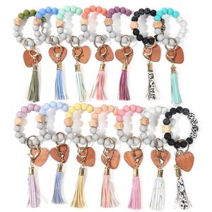 Pu Tassel Keychains Heart Wood Chip Bead Armband Smycken Bangle Silicone Fringe Armband Wristlet Key Ring Pendant Bag Tillbehör