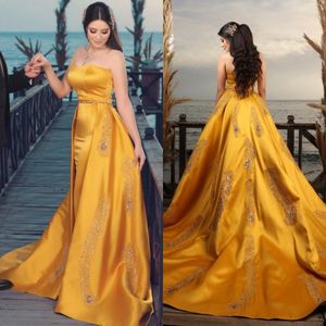 Elegant guld sjöjungfru prom klänningar med avtagbar tåg pärlstav kristall appliqued satin formell kväll slitage festklänningar