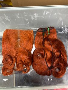 Orange färg bouncy curly fumi mänskligt hår med stängning och frontal