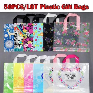 Gift Wrap 50pcs/lot Thick Plastic Bags With Handle For Jewelry Clothing Packaging Large Shopping Cloth Bag Wedding Party BagsGift