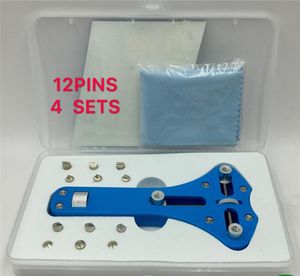 Kit di strumenti di riparazione Apri fondello universale per orologi Strumento per orologiaio in lega regolabile a tre gambe con 12 perni