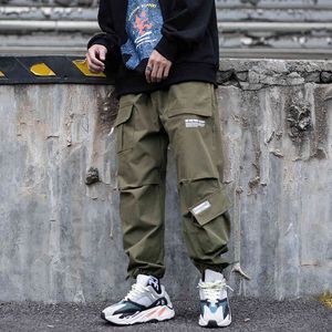 Autunno Multi Tasca Funzionale Vento Lavoro Vestito Piede Pantaloni Moda uomo Sciolto Hip Hop Skateboard Coulisse Sport per il tempo libero