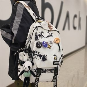 Männer Graffiti Muster Trendy Rucksack Dame Reise Abzeichen Harajuku Tasche Weiblich Männlich College Mädchen Junge Student 220726