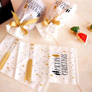 Wholesale favor treat bags resale online - Christmas Decorations Treat Bags Gold Print Drawstring Plastic Favor Gift Pouch Candy Cookie Bag Holiday266W