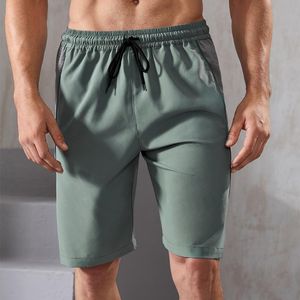 Gymkläder män sportig löpande jogger shorts reflekterande band tejpning fickficka fitness träning basket fotboll träning trunksgym