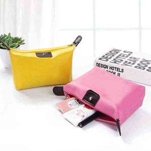 Koreansk version dumpling kosmetisk väska resor tvättar liten objekt lagring väska enkel mode kosmetisk hand 220518
