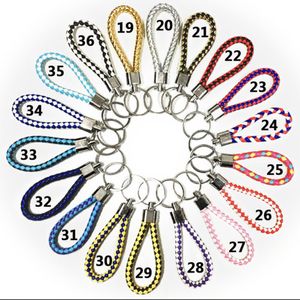 2022 Новое плетеное плетеное кожаное веревочное веревка аксессуары для мужчин женские модные кулон для ключей для ключей маленькие подарки Кольцо 29 Цвета