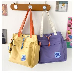 Bolsas de noite, estilo de faculdade japonesa, pequeno e fofo contraste a cor de cor, aluno de grande capacidade ombro de bolsa de bolsa de bolsa de classe