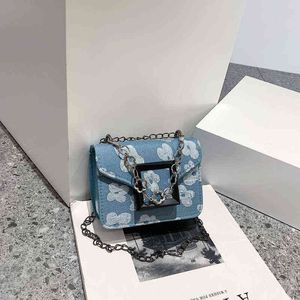 Küçük çanta kadın bahar / yaz yeni moda messenger çanta ileri sens ins niche tasarım tatlı havalı mini sıfır cüzdan 220625