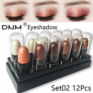 Set di matite per ombretti a 12 colori Impermeabile a lunga durata Glitter Shimmer Eye Shadow Pen Evidenziatore Stick Occhi Strumenti per il trucco