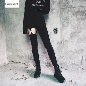 Dark Goth Black Cool Woman Long Pants 2020 Lady Zipper Oregelbundet Hollow Out Cool High Midist Punk Trousers Lady Gothic Tight Pant T200422