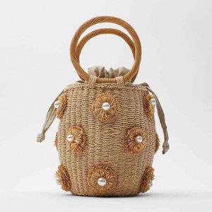 Varumärke MAN-MADE Pearl Basket Bag Women's Rattan Handväskor Runda hinkväskor Flower Portable Bag Ladies Summer Beach Pures 2022 G220531