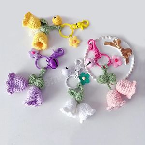 手作りの編み花のキーチェーンファッションヤーンかぎ針編みベルオーキッドフラワーレディースカーキーリングバックパックペンダントジュエリーギフト