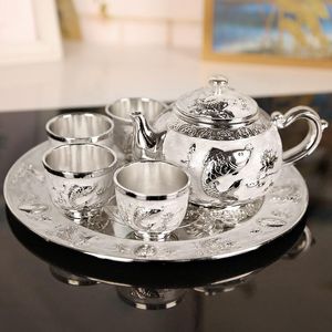 Teaware sätter silver vit te uppsättning, fyra koppar, en tallrik och kruka, tekanna, högkvalitativ kinesisk stil.