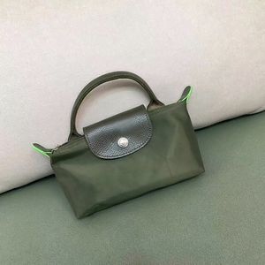 Designer Mini Handväskor Kuddpåsar Luxury Canvas Bucket Bag Hobo Nylon Handväska Handel och Flap är Cowhide äkta läder axelväskor för Women Lady Purse HBP