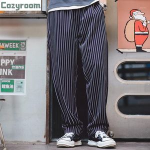 Japansk mode vintage randig lös draperingskock byxor icke-järn tunna casual män män