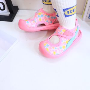Summer paste children's sandals freely adjustable elastic hollow shoes boys and girls shoes
