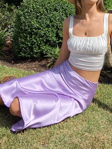 Jupe de soie en satin violet solide Femmes hautes Sumon Long jupe Nouvelle jupe de bureau élégante pour les dames midi printemps