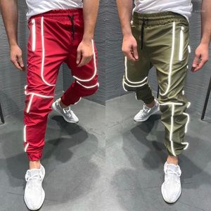 Moomphya Light Reflection Stripes Joggers Men calças de secagem rápida, executando calças refletidas longas e magras masculinas masculinas
