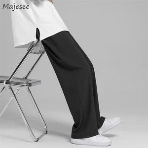 Letnie cienkie satynowe spodnie Mężczyźni Ożyści oddychające szerokie legalne spodnie proste drapowane streetwear M3XL Szybkie suszenie dna 220705