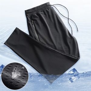 Sportbyxor Mens QuickDrying Ice Silk Breattable Ninepoint Summer Thin Running Fitness Loose Mesh Airconditioning Trousers 220621