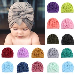 Baby tillbehör nyfödd baby turban båge knut huvud wrap spädbarn bomull mössa hatt vinter varm mössa solida baby shower rekvisita