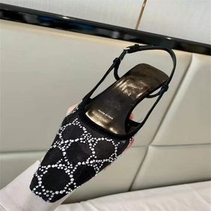 Fashion- Luxury Women's G Slingback Sandals Pump Aria Slingback Shoes presenteras i svart nät med kristaller glittrande motiv tillbaka