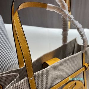 مصمم حقيبة فاخرة جودة عالية التسوق قابلة لإعادة الاستخدام حمل حقائب قماش عالية السعة أزياء العلامة التجارية الترفيه نمط الكتف محافظ 213651