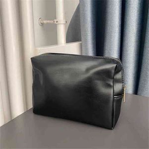 Прямая продажа с фабрики, подлинная подарочная сумка Domtic, черная мягкая кожа для макияжа, однотонная дизайнерская сумка для ручного хранения и отделки