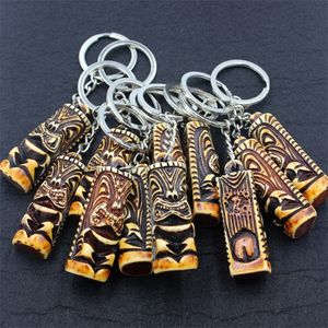 Jewelry Wholesale 12pcs/LOT Cool totem Tiki man keyrings Keychains Car Key Rings for Children's gift YKR26 220507