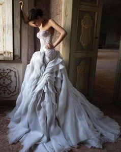 Luxuriöse Designer-Meerjungfrau-Hochzeitskleider mit herzförmigem Ausschnitt und Rüschenrock, Brautkleider, Kristallperlen, Illusion, Spitze, Hochzeitskleid nach Maß