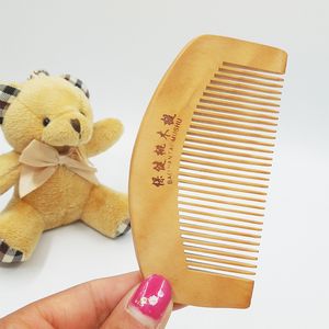 A wooden comb hair care anti-static portable makeup small comb anti off June Hair Brushes