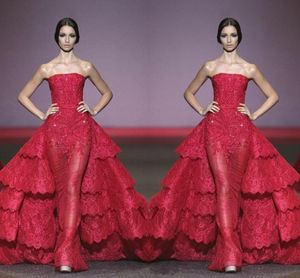 Amazing Red Lace Tiered Prom Klänningar Sexig Strapless Sheath See Through Evening Gowns Layered Sweep Train Runway Fashion Pageant Dresses