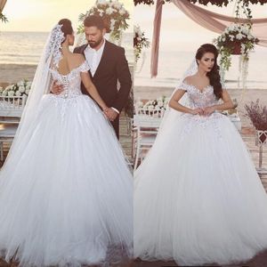 Arabskie Duże Suknie Ślubne Suknie Ślubne Off Shoulder Nude Wyświetlone Top Romantic Lace Aplikacje Miękkie Tulle Puffy Suknie Ślubne Gorset Powrót