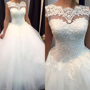 Abiti da sposa con abiti da ballo con perle di pizzo affascinanti Abiti da sposa su misura Plus Size Collo trasparente Corsetto senza schienale sexy Abiti da sposa con perline in tulle bianco