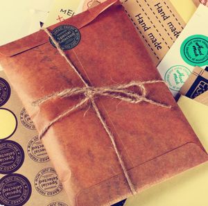 Wholesale-50pcs/Set Retro Style Brown Kraft Paper Envelope Postcard دعوة خطوة القرطاسية حقيبة هدايا Air Mail Envelope