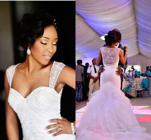 2021 African Luxury Mermaid Wedding Dresses Plus Size Cap Sleeves Crystal Beaded Court Train Bridal Gowns See Through Back Ruffles Tiered Skirt