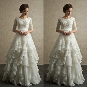 Gorgeous Wedding Dresses Cheap A Line Crew Neck Short Half Sleeves Beaded Lace Appliques Bridal Gowns Ruffled Floor Length Skirt