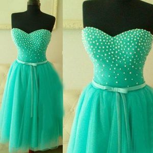 Förtjusande Turkos Prom Klänningar En Linje Sweetheart Neckline Pärlor Topp Tulle Kort Formell Klänning Med Sash Bow Graduation Party Gowns