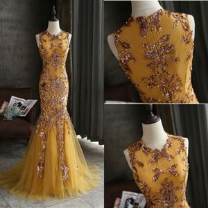 100% Real Photos Gold Mermaid Prom Klänningar Sequined Sheer Neck Ärmlös Aftonklänningar Tulle Sweep Train Sparkly Formal Party Dress