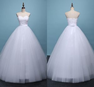 2018セクシーなチュールビーチのウェディングドレス2017恋人レースAラインの実際の画像安いブライダルガウンプラスサイズの国結婚式の花嫁のドレス