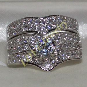 Eternal Lady s Sterling Silver Round Simulated Diamond Heart CZ Paved Wedding Band Ring Set för kvinnor